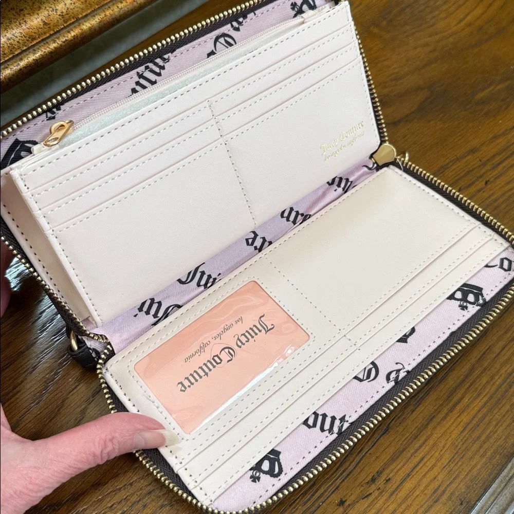 Juicy Couture Love & Crown Logo Wristlet. Zip around. Brown and tan color.